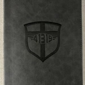 A black book with a shield and number 4 3 9